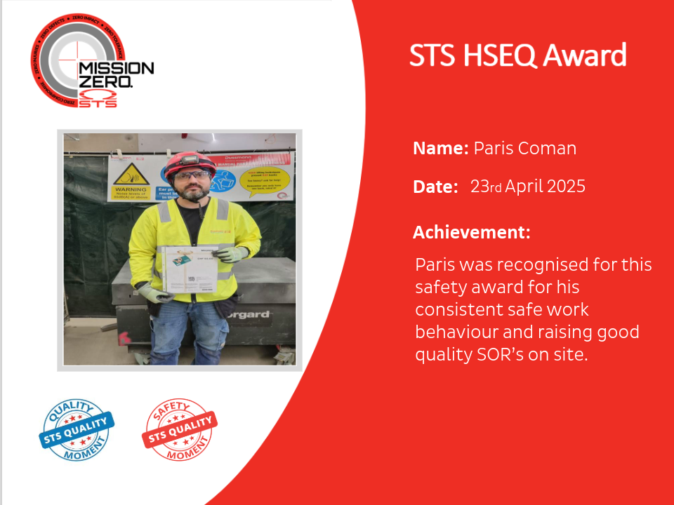 Paris Coman, wearing safety gear, holds a certificate in a workshop. He received the STS HSEQ Award for safe work and quality SORs on April 23rd, 2025.